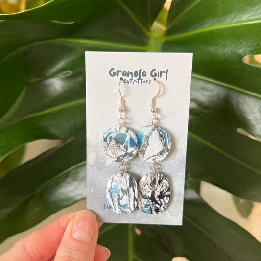 pair of blue and white earrings
