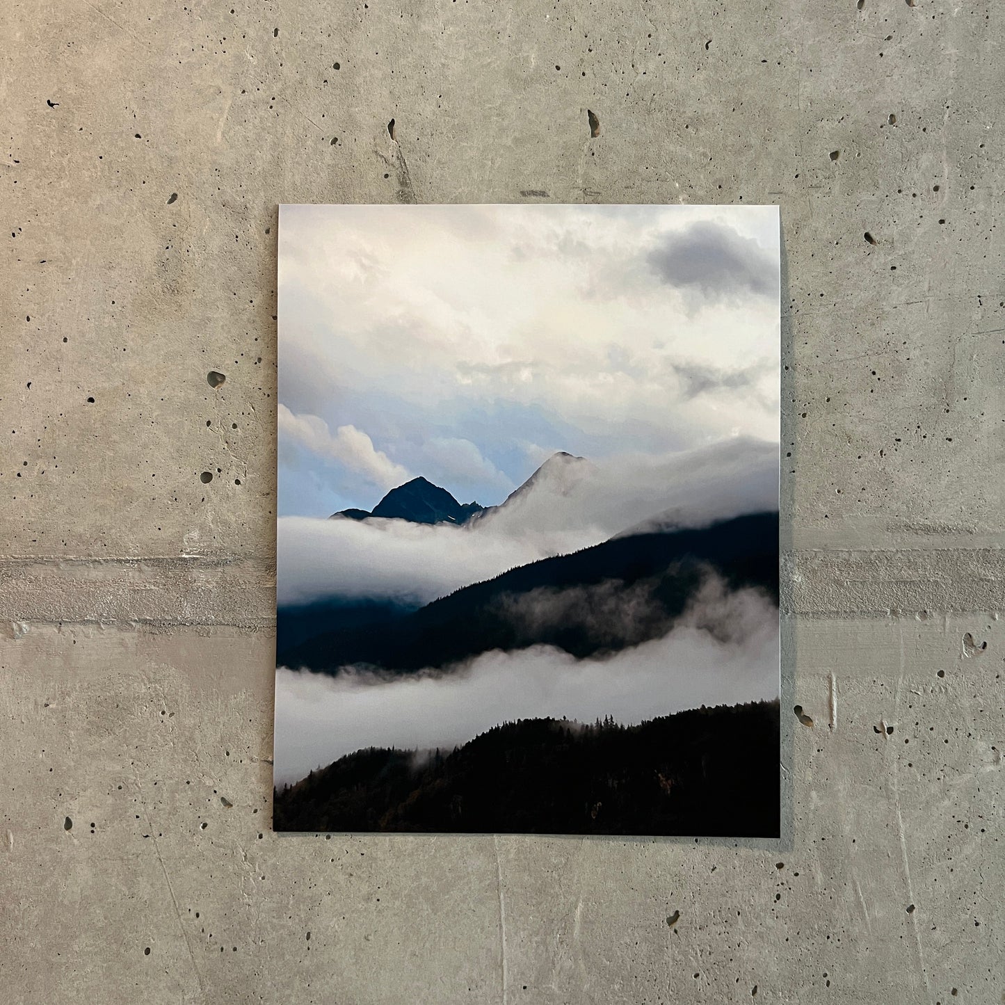 art print of a photo of fog covered mountains
