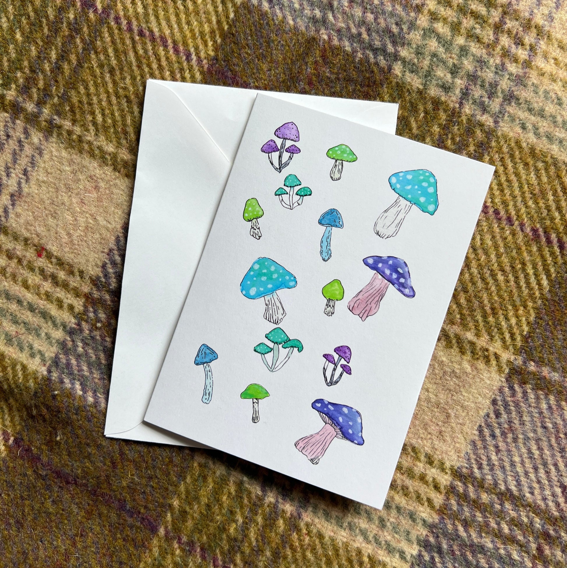 card with colorful watercolor mushrooms